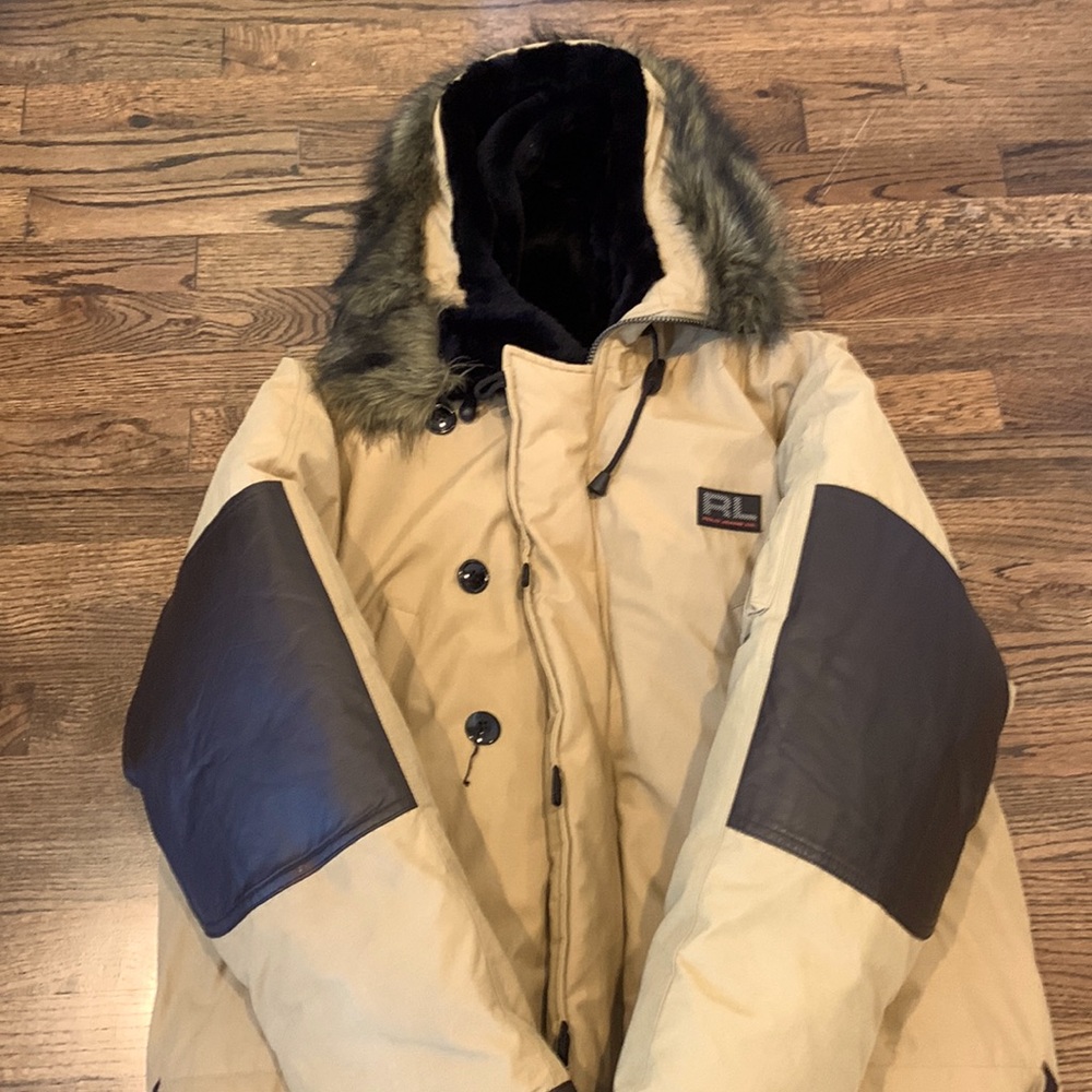 Coat was worn only once. Excellent condition but does have one button missing.